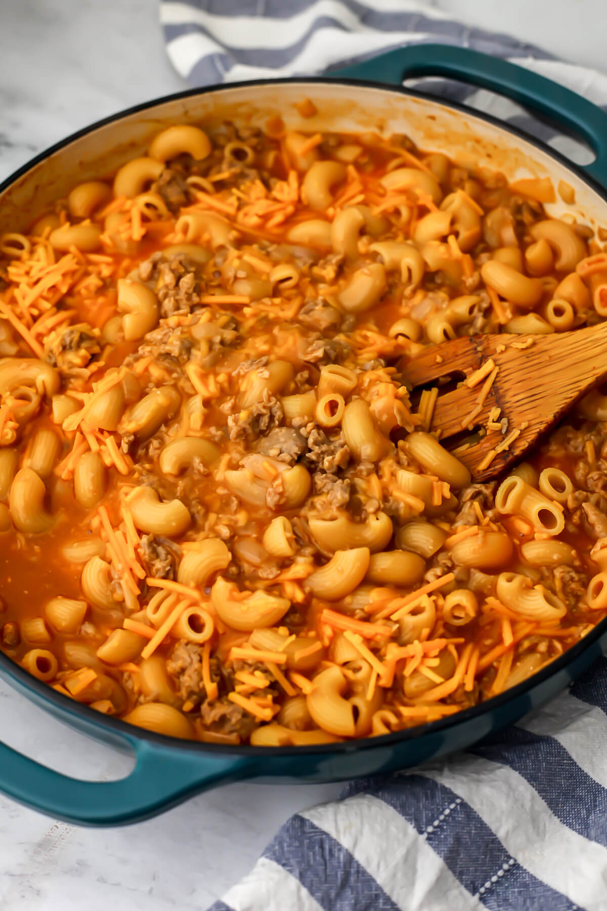Vegan hamburger helper after the cheese has been added.