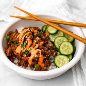 A vegan Bulgogi, aka Korean beef, served over rice and drizzled with spicy vegan mayo.